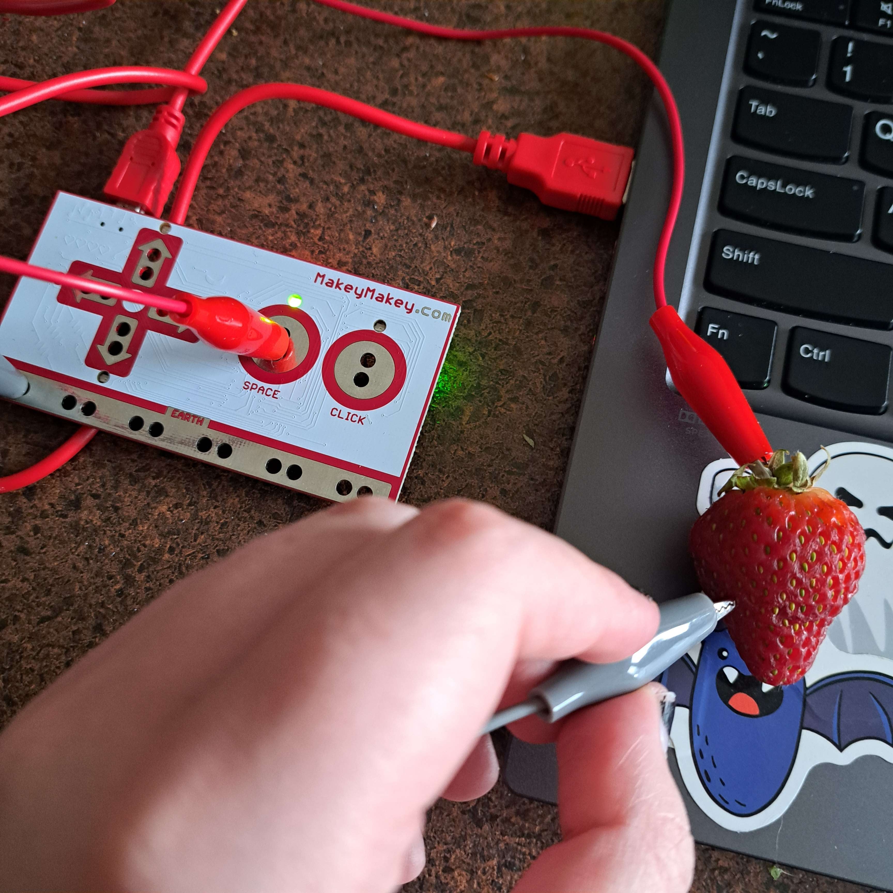 testing conductivity of foods part 3<br>strawberries are conductive